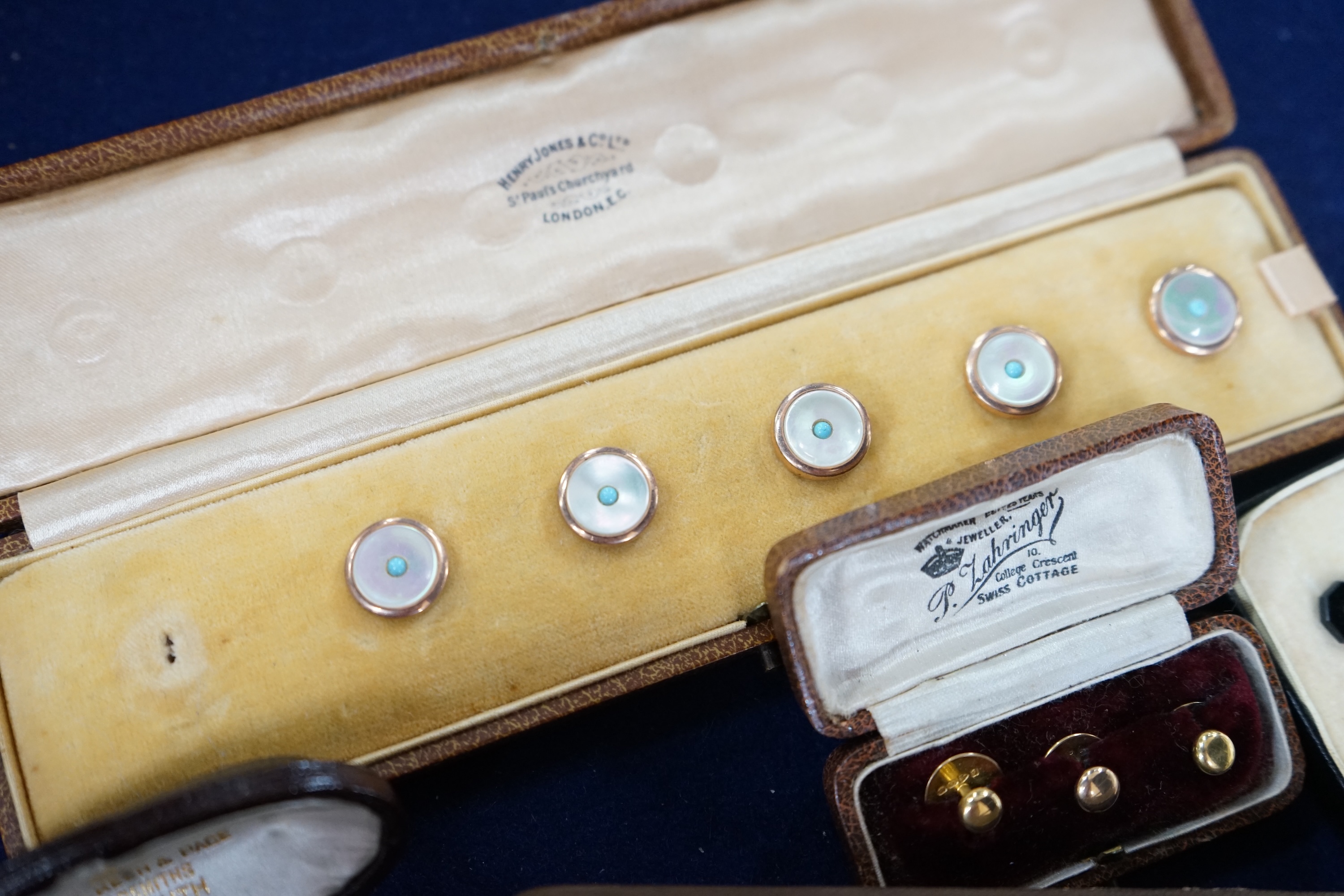 Two cased sets of three 18ct dress studs, 5.9 grams and three other cased sets of studs, one incomplete. Condition - fair to good